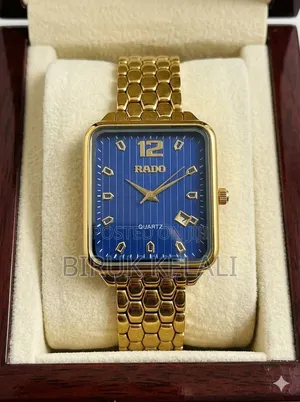 Rado Quartz Watch Featuring a Rectangular Case, a White Dial