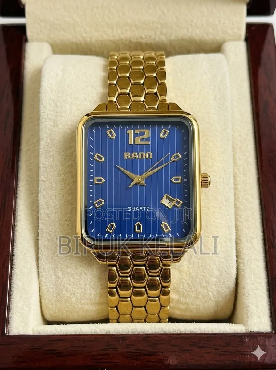 Rado Quartz Watch Featuring a Rectangular Case, a White Dial