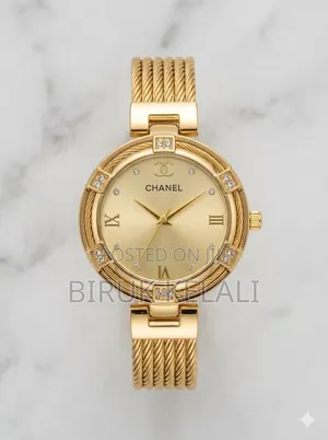Chanel Women's Watch With a Gold-Toned Case and a Black Dial.