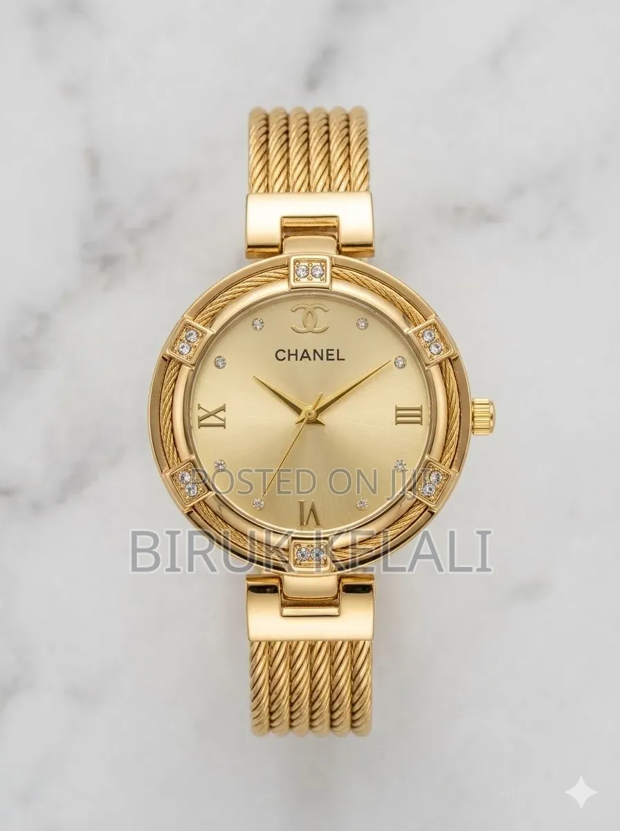 Chanel Women's Watch With a Gold-Toned Case and a Black Dial.