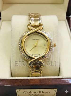Calvin Klein Ladies' Watch, Specifically a Gold-Tone Crystal