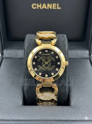 Chanel Women's Watch in a Gold-Tone Variant With a Black Dial