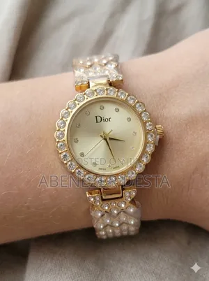 Dior Quartz Stone Watch With a Gold- Tone Cuff Bracelet