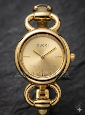 Gold-Tone Gucci Classic Lady Watch With a Ring Bracelet,