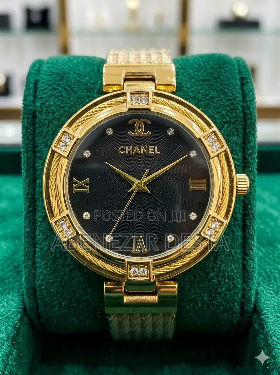 Chanel Watch With a Gold-Toned Case and a Black Dial