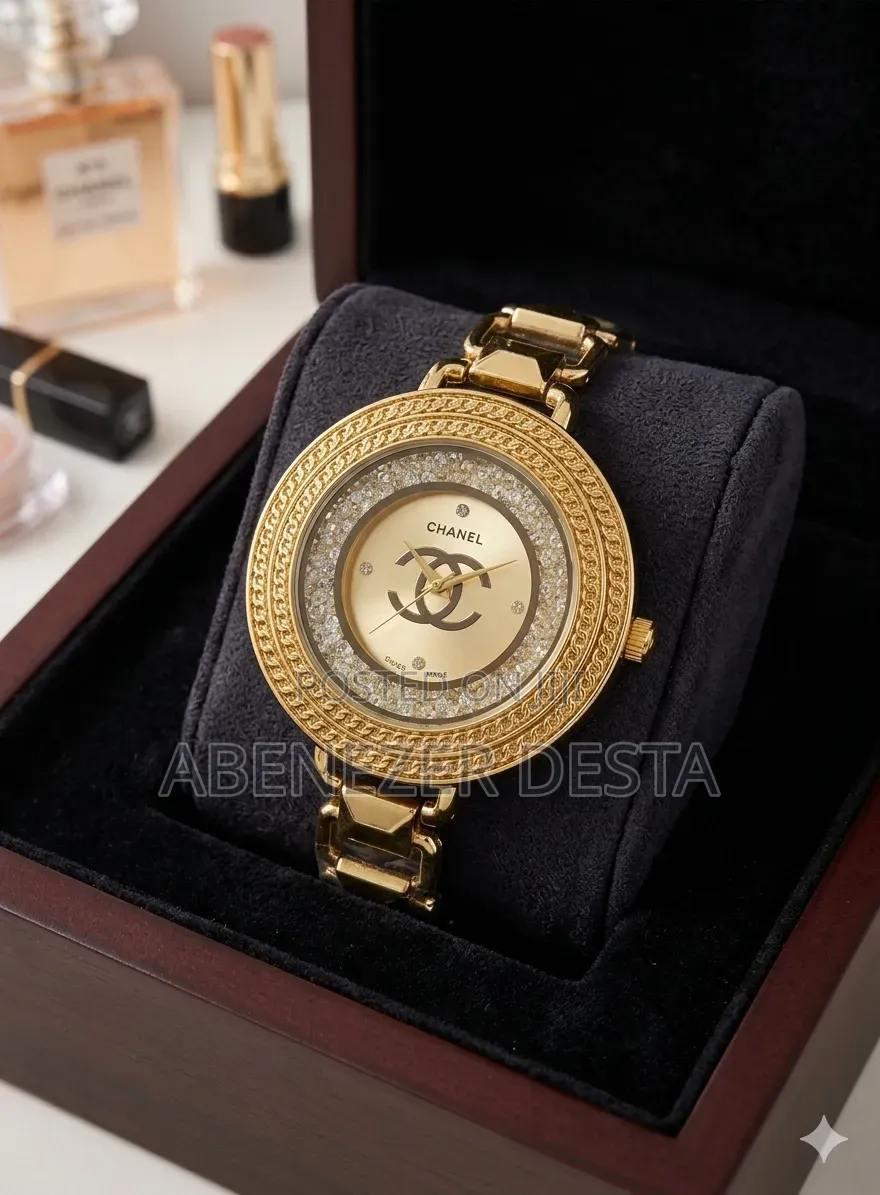Gold-Toned Chanel Women's Watch Featuring a Chain-Style Bezel