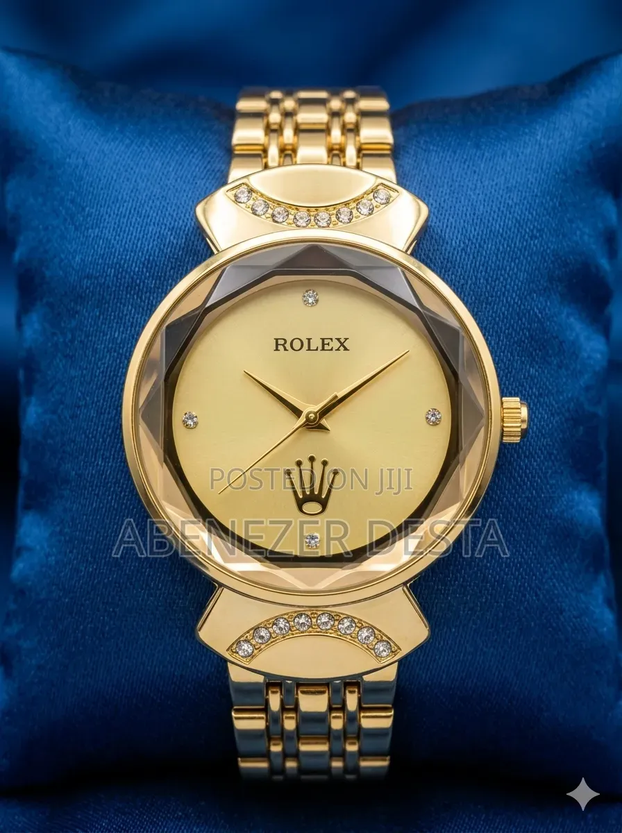 Gold-Toned Rolex Women's Luxury Watch With a Faceted Bezel.