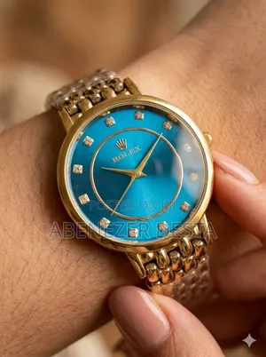 Rolex Women's Luxury Watch Featuring a Blue Dial and a Gold-Colored