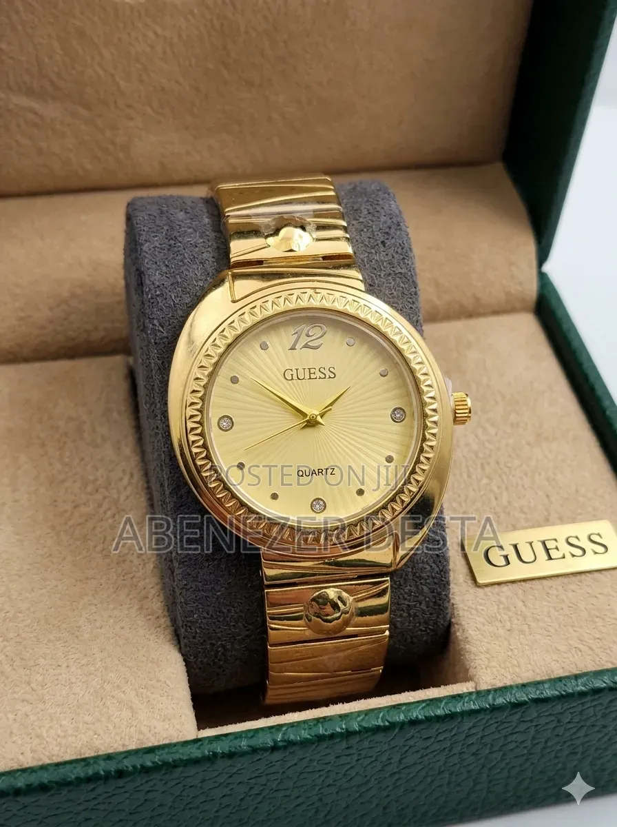 Guess Women's Analog Quartz Watch, Similar to The
