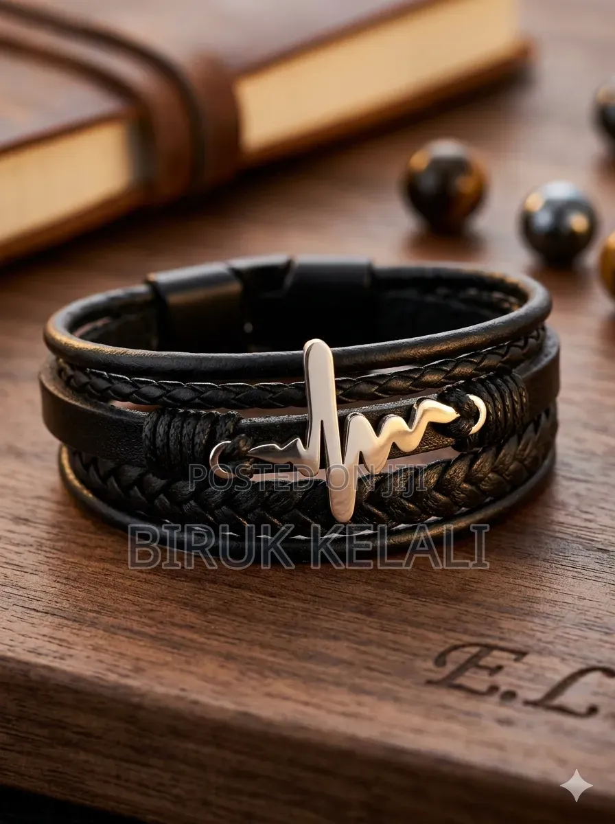 Layered Black Leather Bracelet Featuring a Stainless Steel Heartbeat