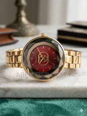 Gold-Tone Gucci Women's Watch Featuring a Distinct Red Dial