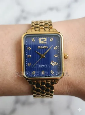 Gold-Tone Rado Quartz Watch Featuring a Blue Dial With Diamond-Style