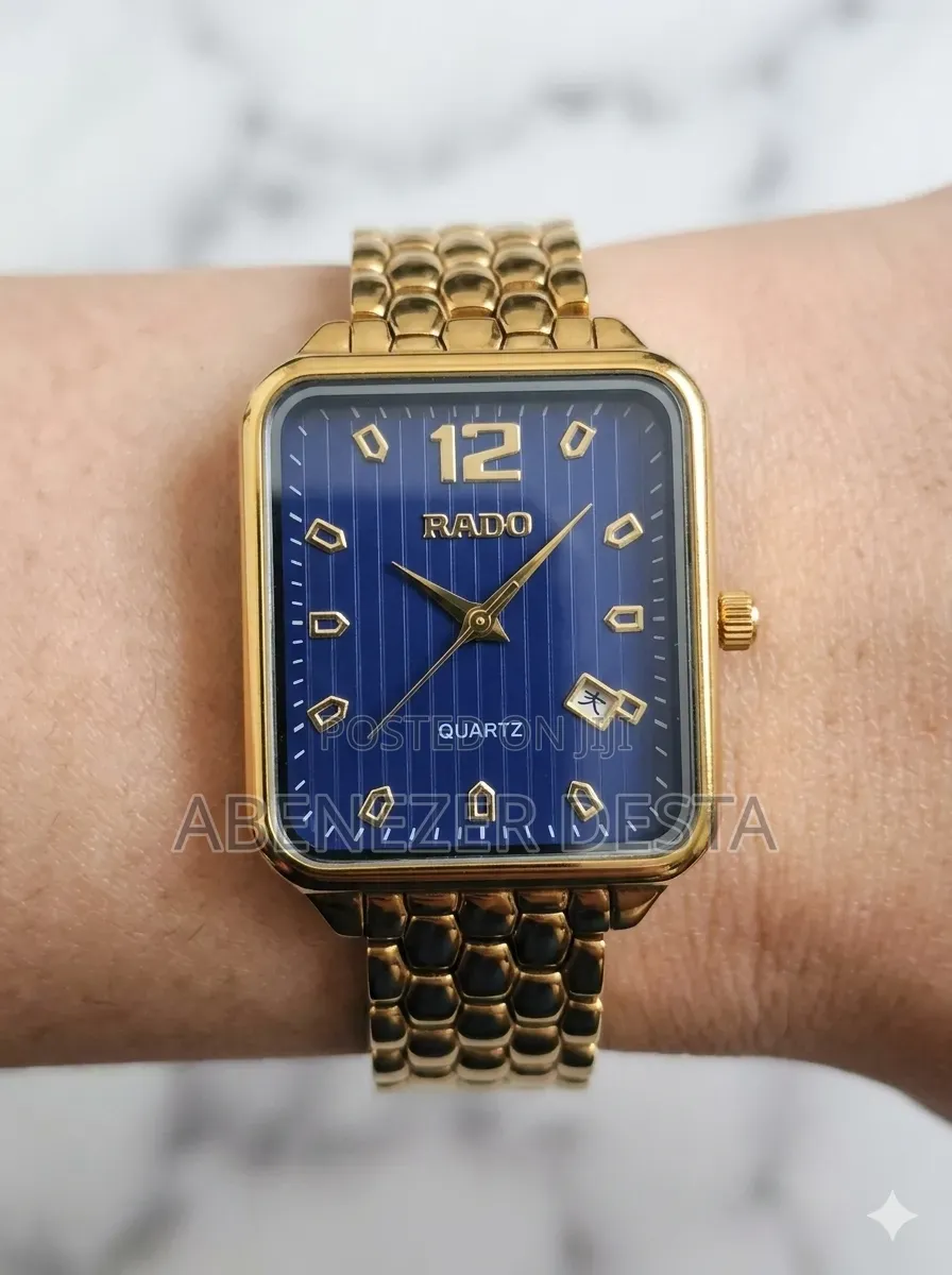 Gold-Tone Rado Quartz Watch Featuring a Blue Dial With Diamond-Style