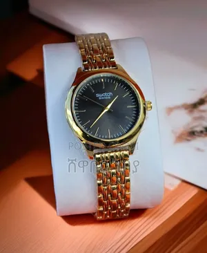 Stylish Swatch Swiss Gold Watch With Black Dial - Addis Ababa