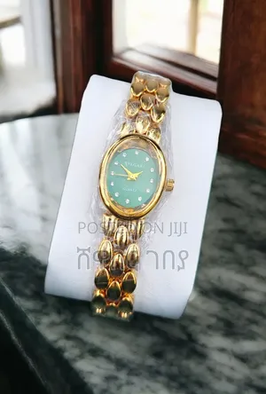 Elegant Bvlgari Women's Gold Quartz Watch - Emerald Green Dial