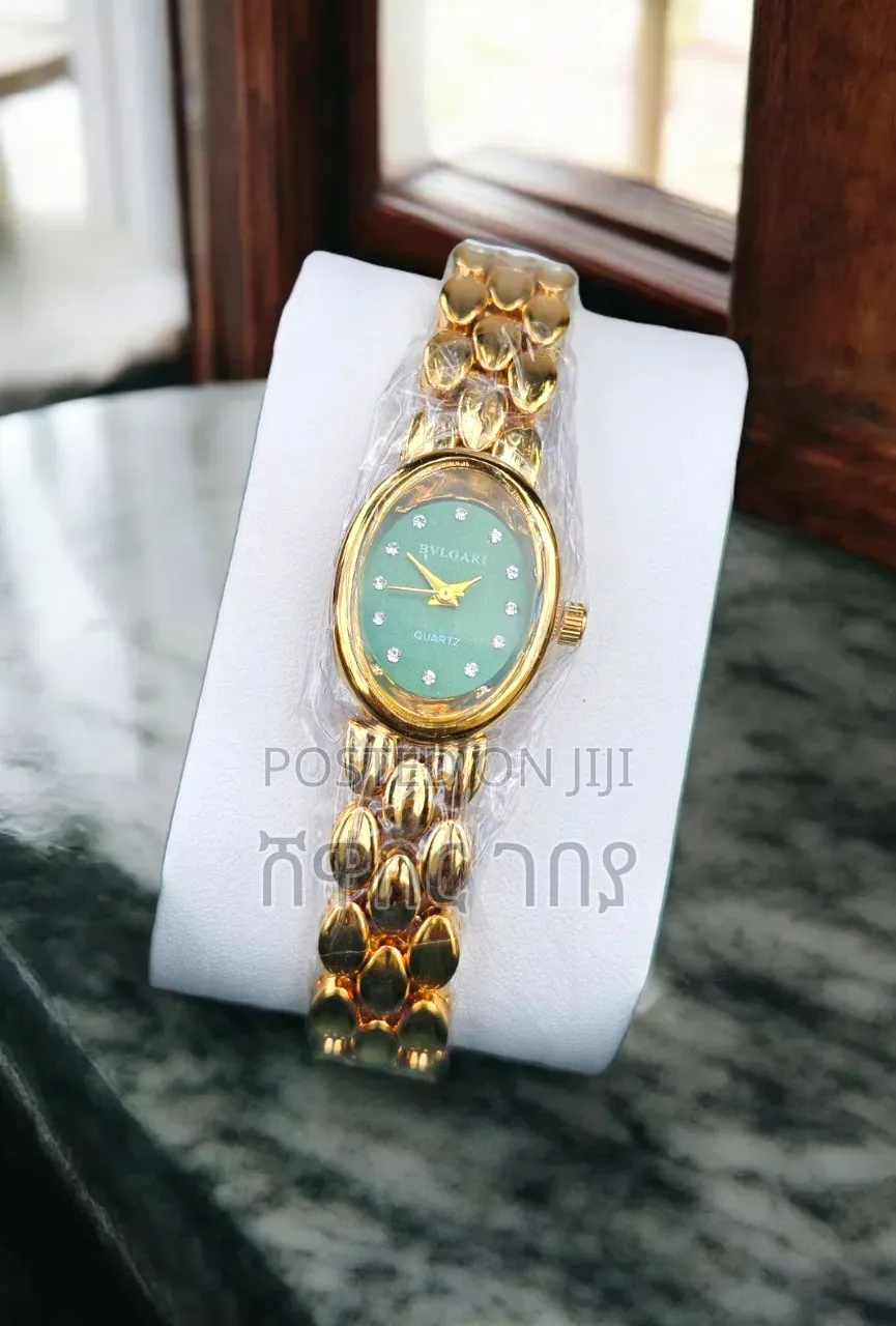 Elegant Bvlgari Women's Gold Quartz Watch - Emerald Green Dial