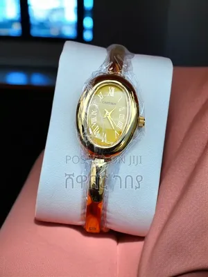 Elegant Cartier-Style Ladies Oval Bangle Watch - Brand New