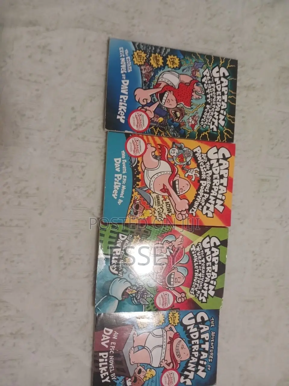 8 Parts of Captain Underpants Series by Dav Pilkey.
