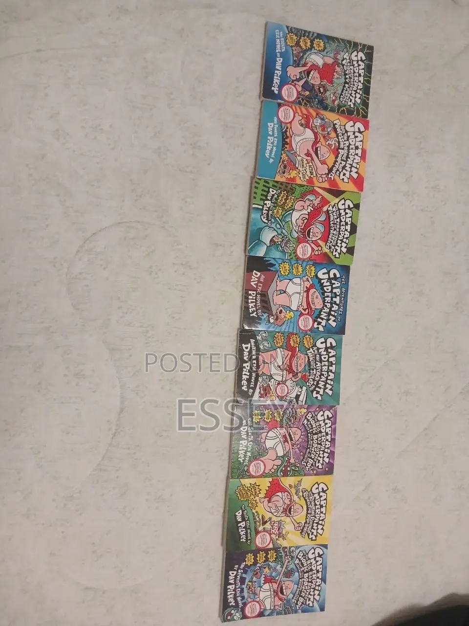 8 Parts of Captain Underpants Series by Dav Pilkey.