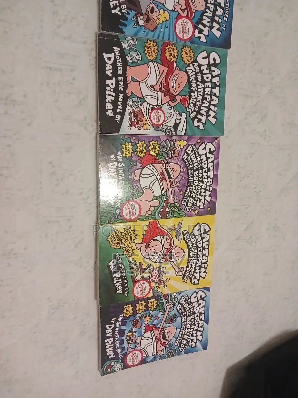8 Parts of Captain Underpants Series by Dav Pilkey.
