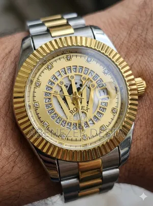 Rolex Day-Date Style Wristwatch, Commonly Found as a Gold-Tone Quartz