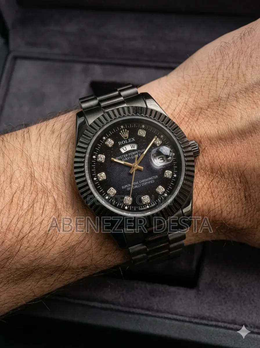 Day-Date Style Watch, Specifically a Stainless Steel Model With a Gold