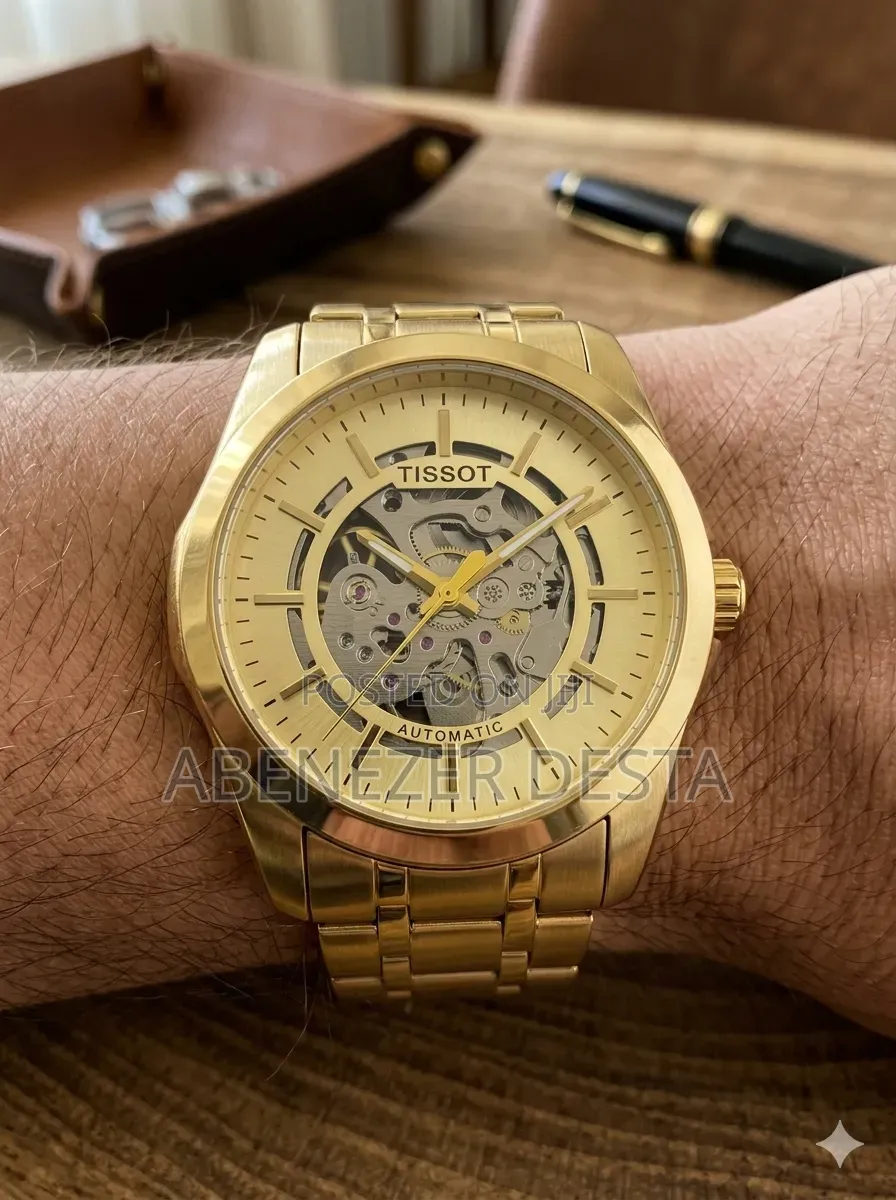 Gold-Toned Tissot Automatic Men's Watch Features a Skeleton Dial And