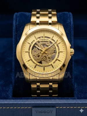 Gold-Toned Tissot Automatic Men's Watch Features a Skeleton Dial And