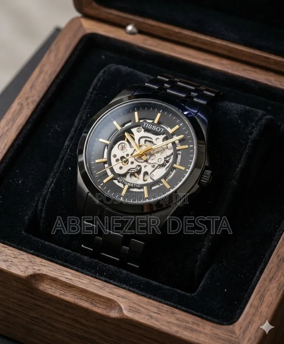 Tissot Automatic Skeleton Watch, Featured in a Black and Gold Color