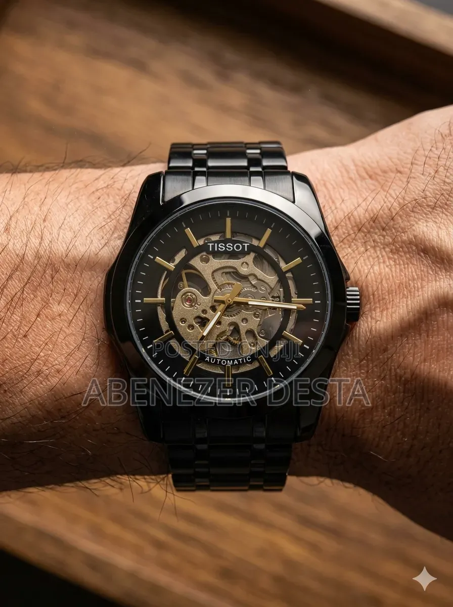 Tissot Automatic Skeleton Watch, Featured in a Black and Gold Color