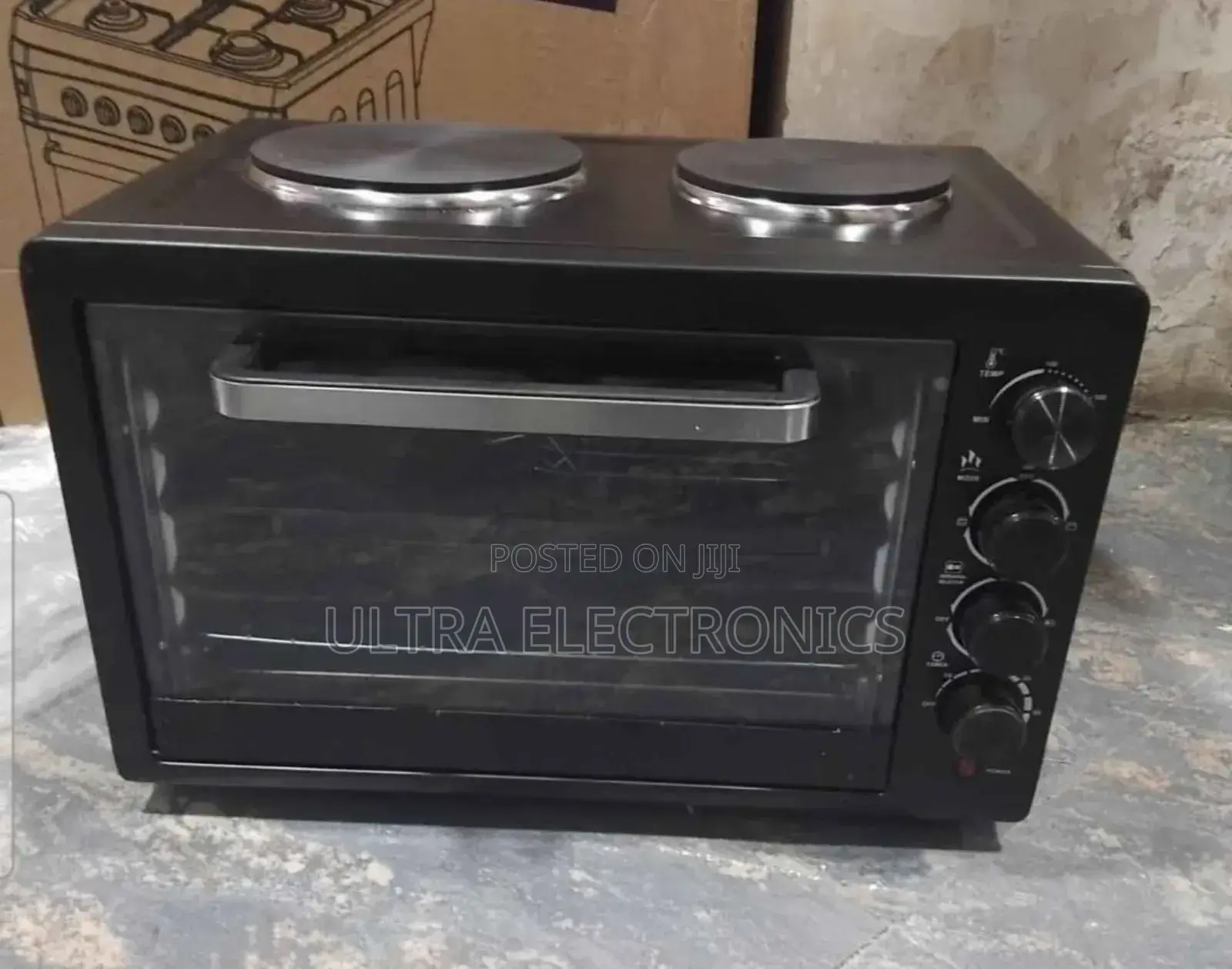 Electric Mini Oven With a 2-Plate Stove on Top.