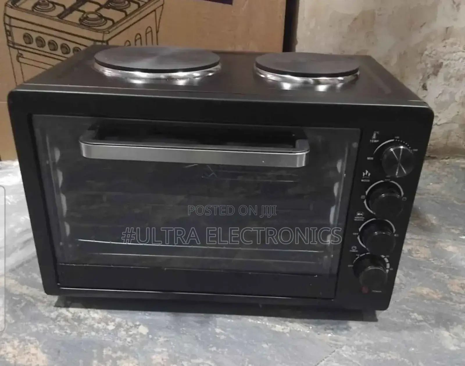 Electric Mini Oven With a 2-Plate Stove on Top.
