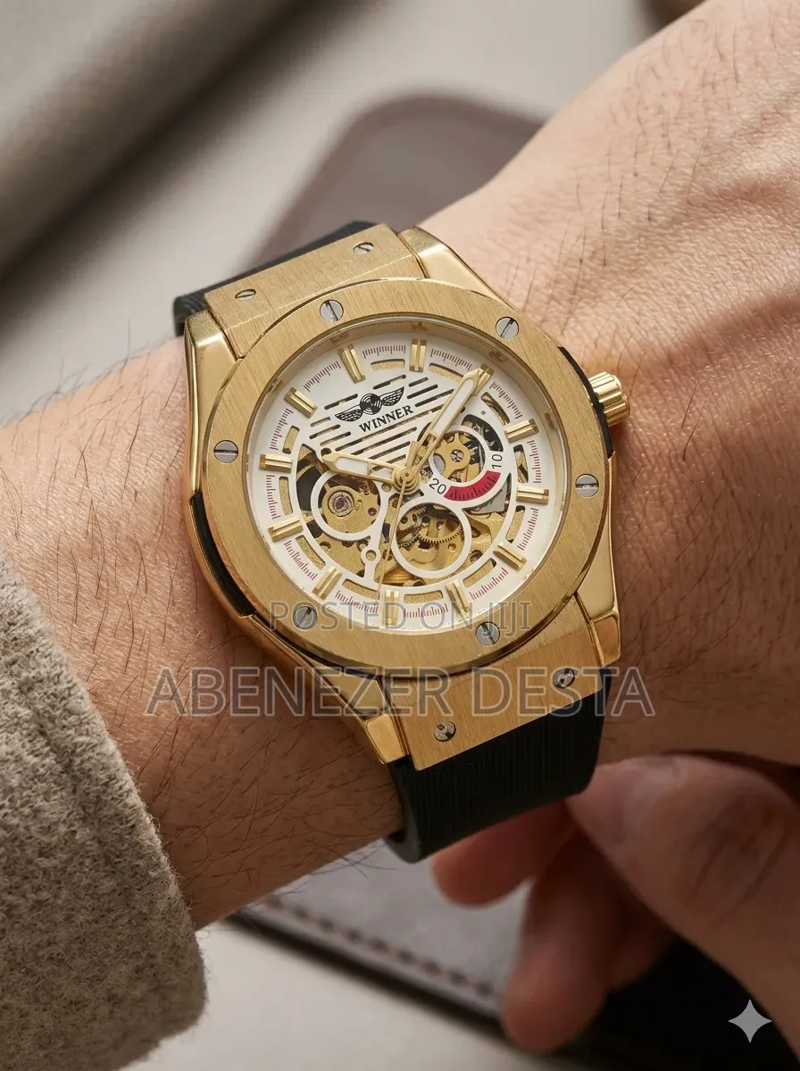 Winner Automatic Mechanical Hollow Out Men's Watch With a Gold-Tone