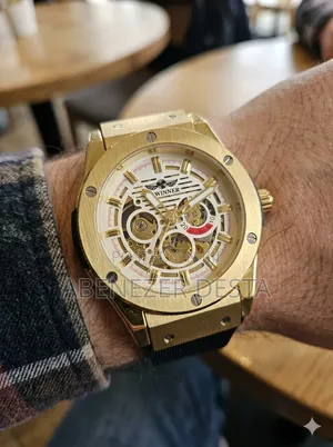 Winner Automatic Mechanical Hollow Out Men's Watch With a Gold-Tone