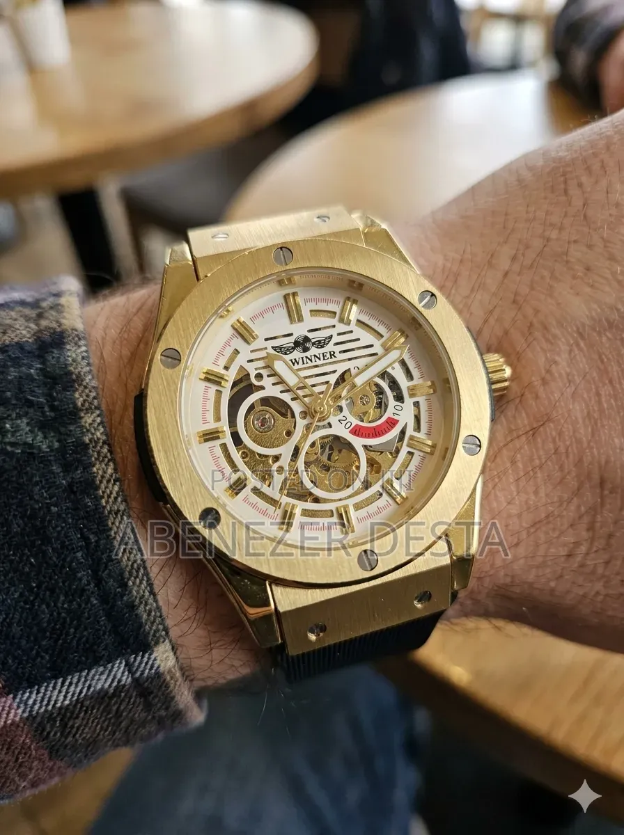 Winner Automatic Mechanical Hollow Out Men's Watch With a Gold-Tone