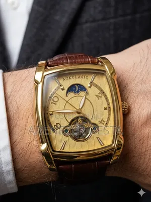 Brand Automatic Mechanical Watch Features a Tonneau-Shaped Gold Case,