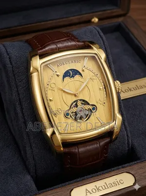 Brand Automatic Mechanical Watch Features a Tonneau-Shaped Gold Case,