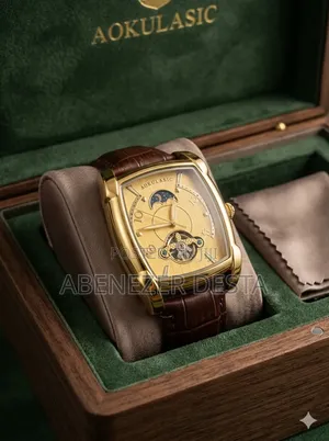 Brand Automatic Mechanical Watch Features a Tonneau-Shaped Gold Case,