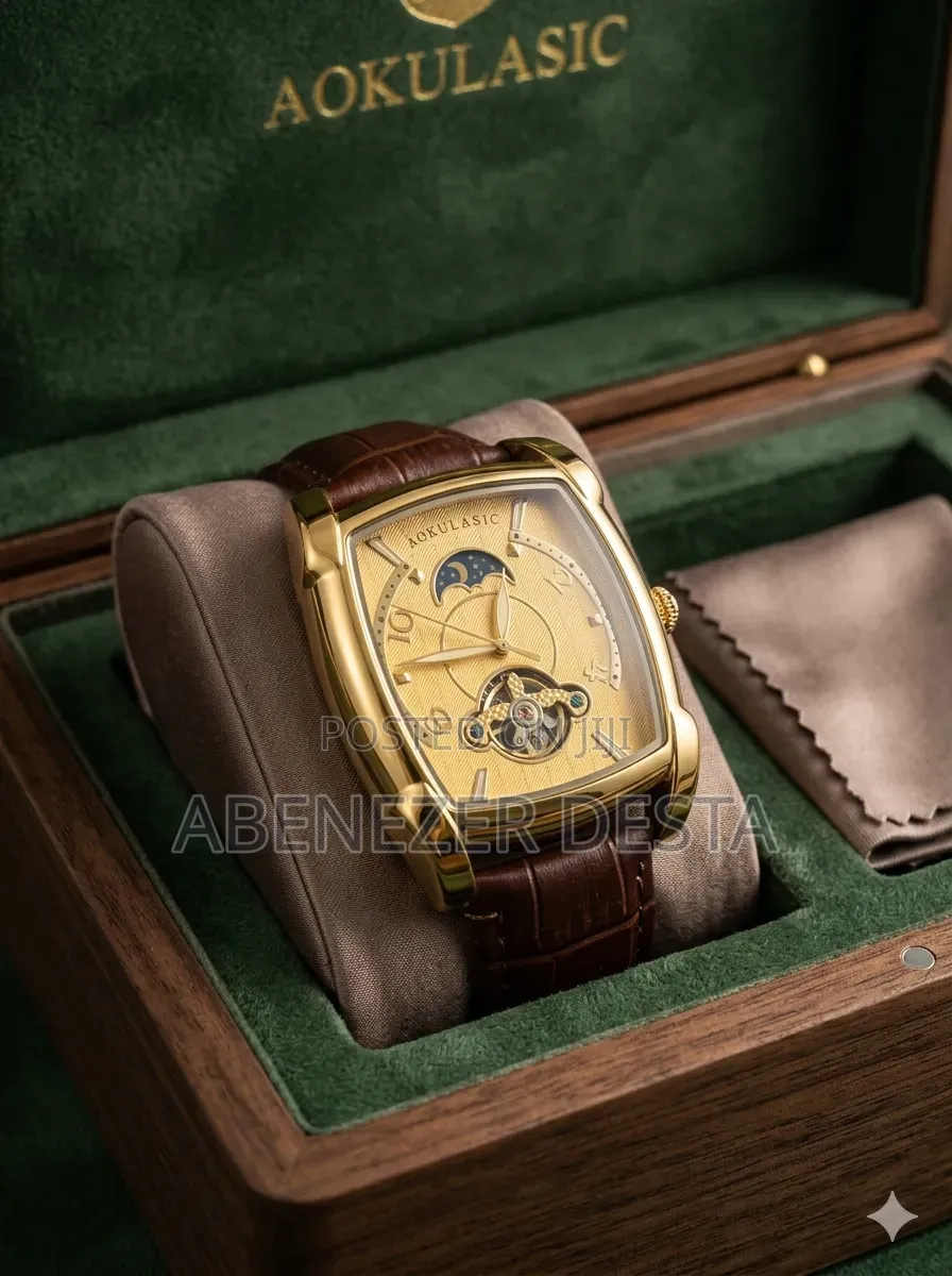 Brand Automatic Mechanical Watch Features a Tonneau-Shaped Gold Case,