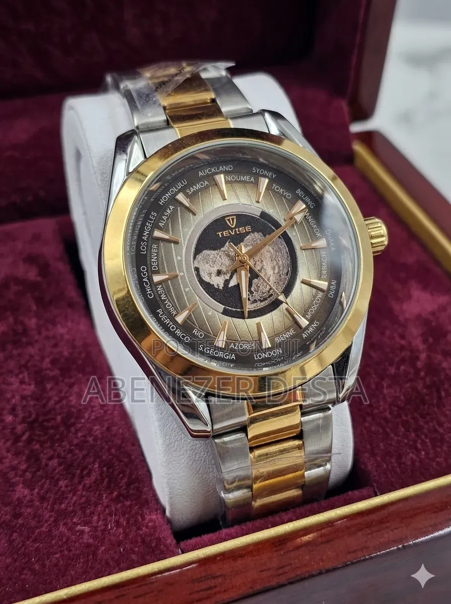 Tevise Wristwatch Features a Gold and Silver Stainless Steel Band And