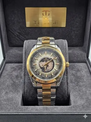 Tevise Wristwatch Features a Gold and Silver Stainless Steel Band And