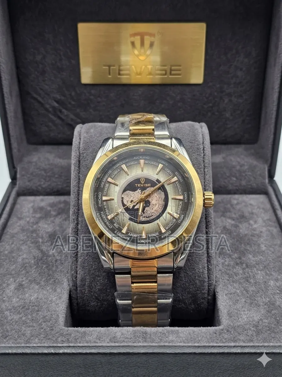 Tevise Wristwatch Features a Gold and Silver Stainless Steel Band And