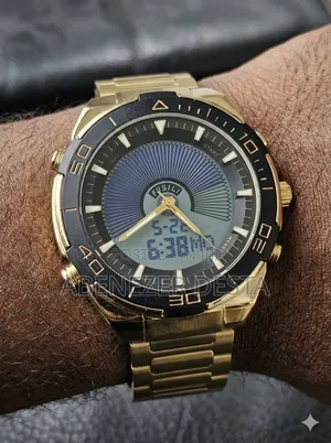 Gold-toned Analog-digital Wristwatch Appears To Be A Dual-time Model L