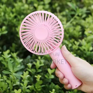 .Portable Mini Hand Fan .