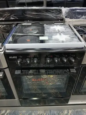 Oven Klass Brand and Stove Range. It Features a Black Finish.