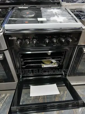 Oven Klass Brand and Stove Range. It Features a Black Finish.