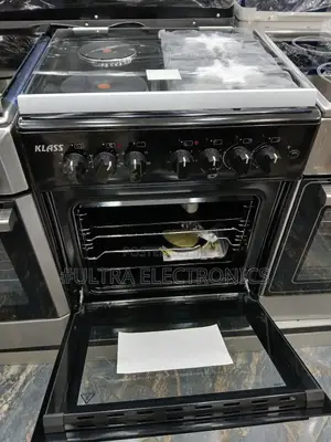 Oven Klass Brand and Stove Range. It Features a Black Finish.
