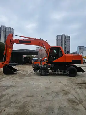 Excavator ታየር ኤክስካቫተር
