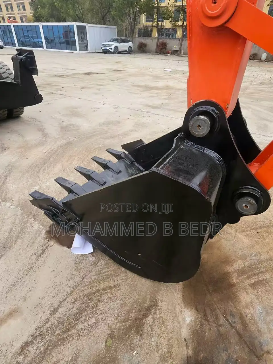 Excavator ታየር ኤክስካቫተር