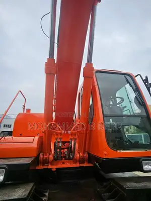 Excavator ታየር ኤክስካቫተር